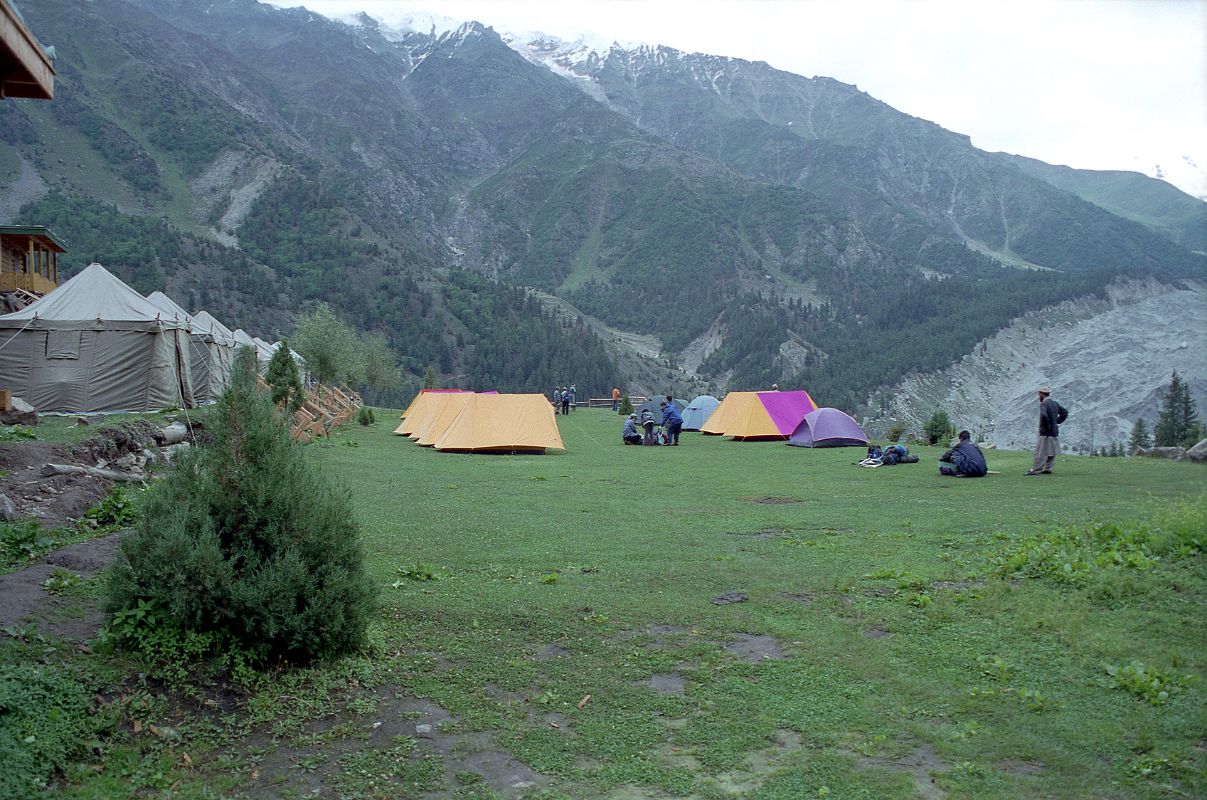 05 Fairy Meadows Campsite From Tato we hiked gradually ascending the narrow gorge of Tato River, the track clinging high on its left bank. We pass through green juniper and pine trees, and arrive at Fairy Meadows (3200m). Fairy Meadows is a spectacularly pine forested alpine meadow overlooking the Rakhiot Glacier. Its name comes from a local superstition that fairies inhabit the area.